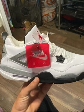 Men’s white cement Jordan 4